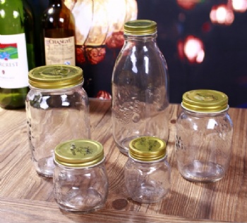 fruit emossed glass storage jar with metal lid B02110001