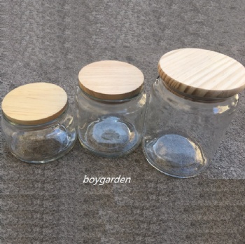  glass storage jar with bubble lid or wooden lid B02113018	